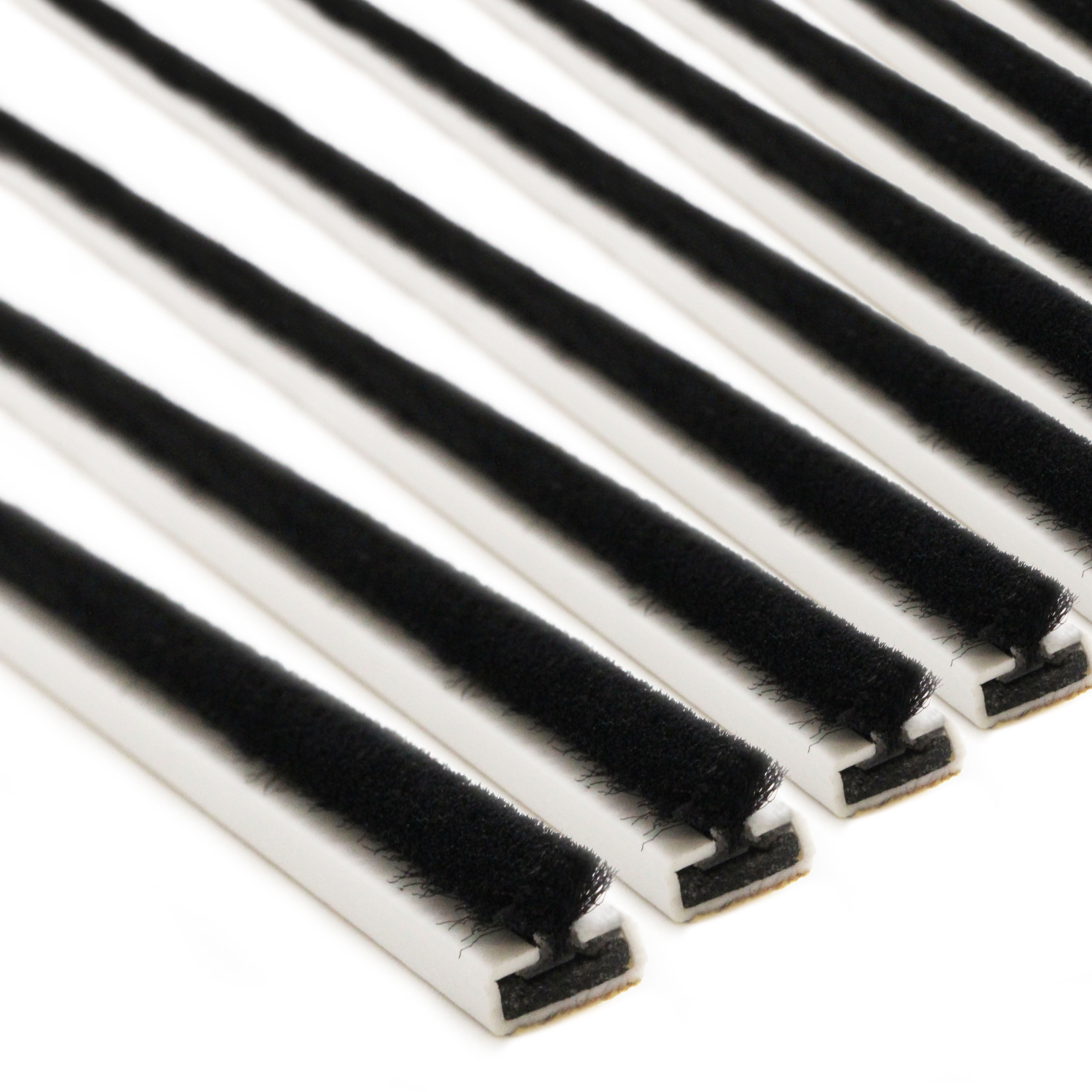 White Intumescent Strips With Black Brush Seal