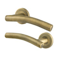 Arched Antique Brass Lever on Rose Door Handles