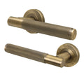 Aurora Antique Brass Lever on Rose Door Handles - Heavy Duty - FD30/60 Rated