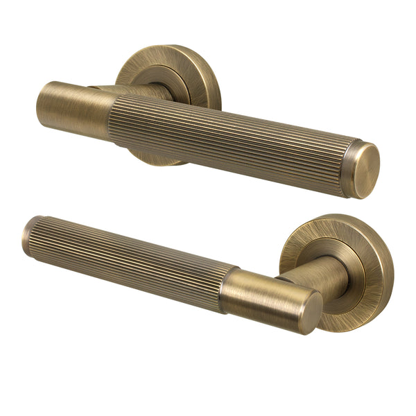 Aurora Antique Brass Lever on Rose Door Handles - Heavy Duty - FD30/60 Rated - tradefit - Featured Image