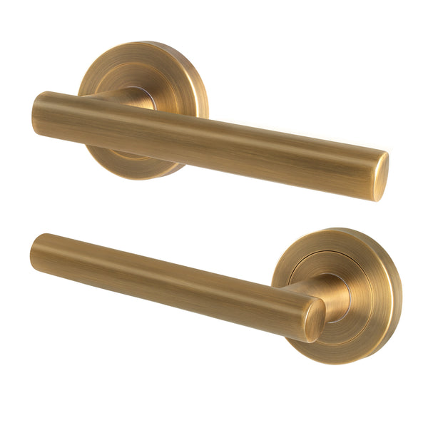 Olbia Antique Brass Lever on Rose Door Handles - tradefit - Featured Image