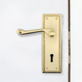Georgian Rope Edge Scroll Polished Brass Door Handles - Keyhole - tradefit