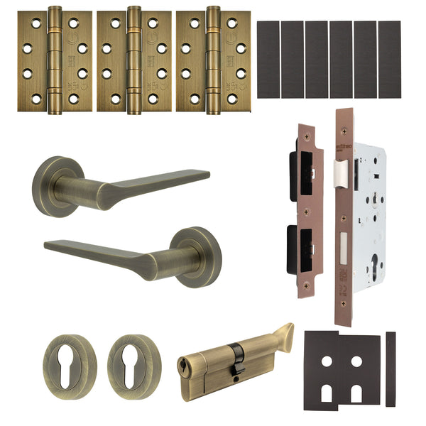 Tapera Antique Brass Lever on Rose Door Handle Kit - Heavy Duty FD30/60 - DIN Euro Sashlock and Thumbturn Cylinder - Keyed to Differ - tradefit - Featured Image