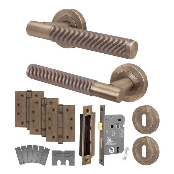 Aurora Antique Brass Lever on Rose Door Handle Kit - Medium Duty FD30/60 - 80mm Sashlock - Featured Image