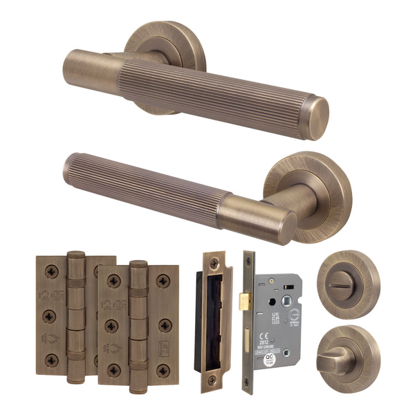Aurora Antique Brass Lever on Rose Door Handle Kit - 64mm Bathroom Lock - Featured Image